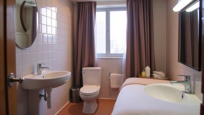 How to Survive Sharing One Bathroom in a Tiny Hotel Room
